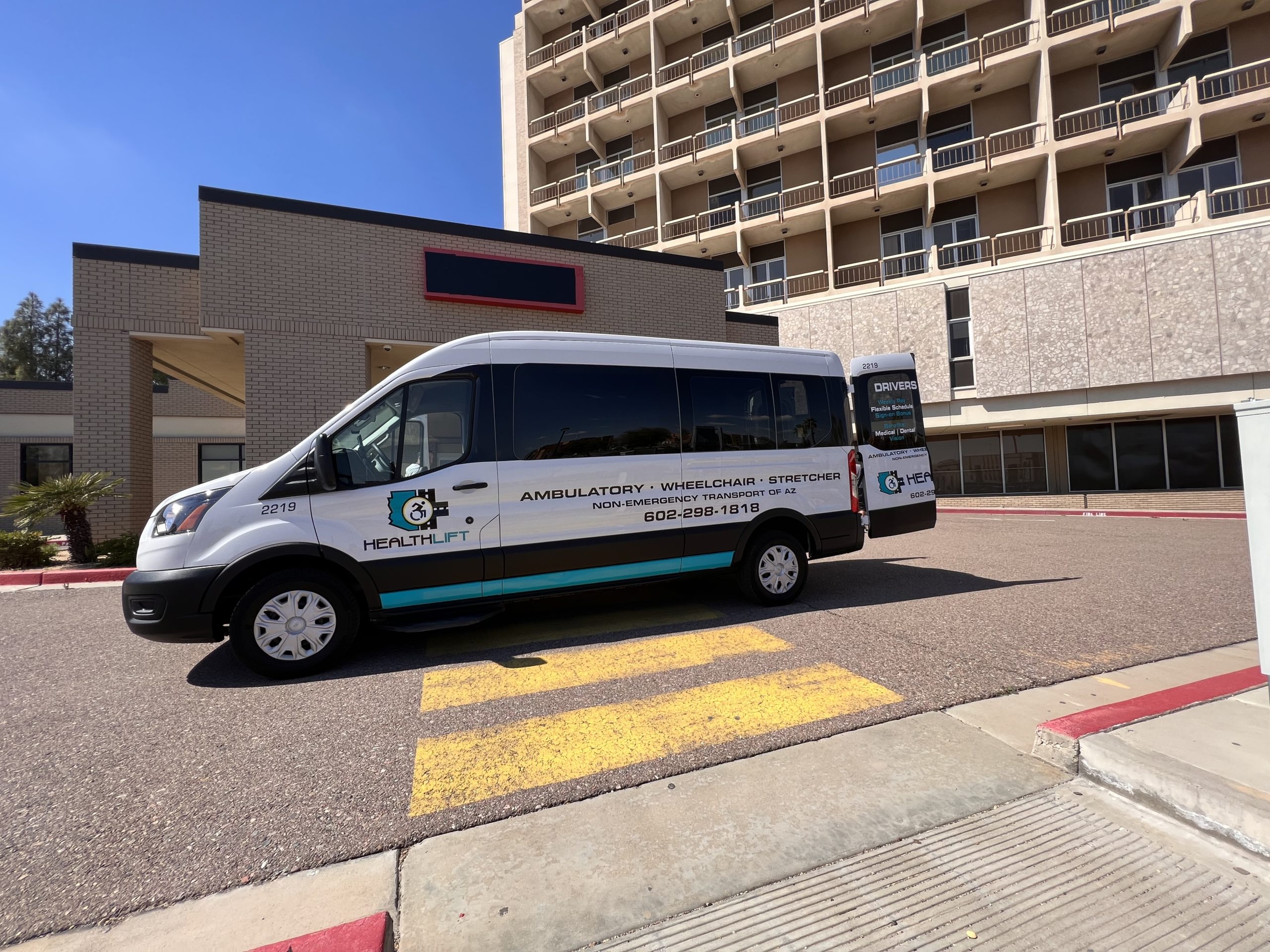 HealthLift Amputee Transport Van Parked Outside