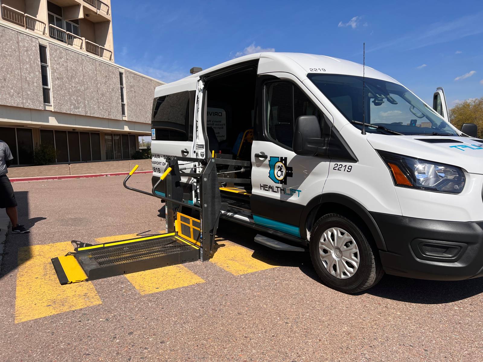 Senior Transportation Van With Wheelchair Lift Deployed