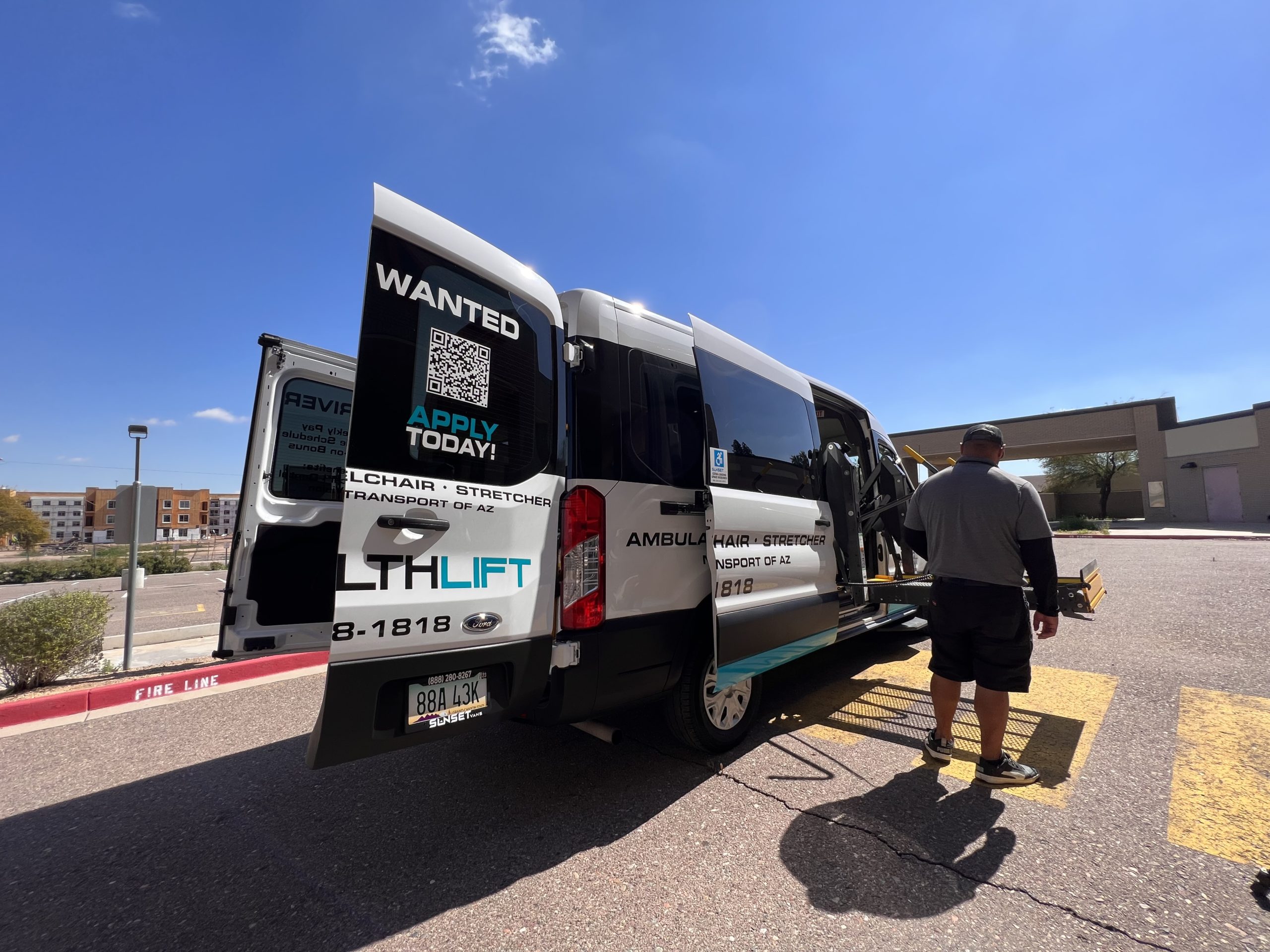 HealthLift Van with Open Doors and Attendant at the Lift