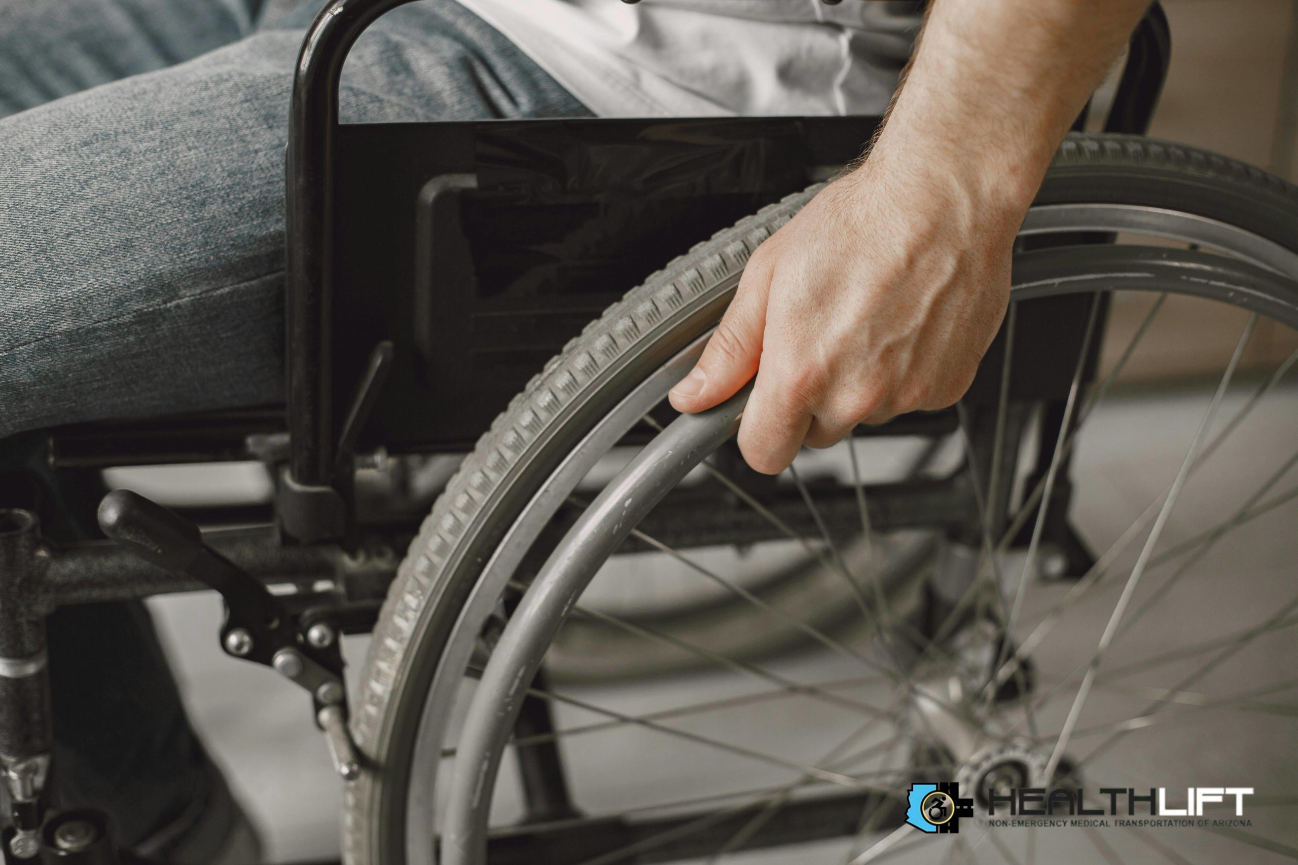 Hand on Wheelchair Wheel During Stroke Recovery
