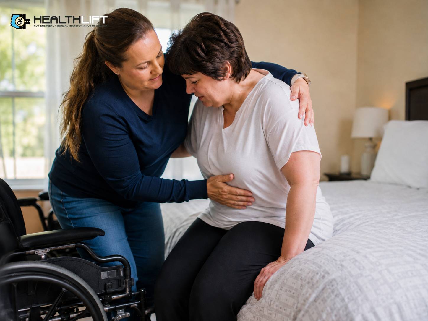 caregiver-helping-wheelchair-transfer Caregiver Helping with Wheelchair Transfer