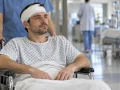 TBI Patient With Severe Brain Injury Waiting for Wheelchair Accessible Transportation